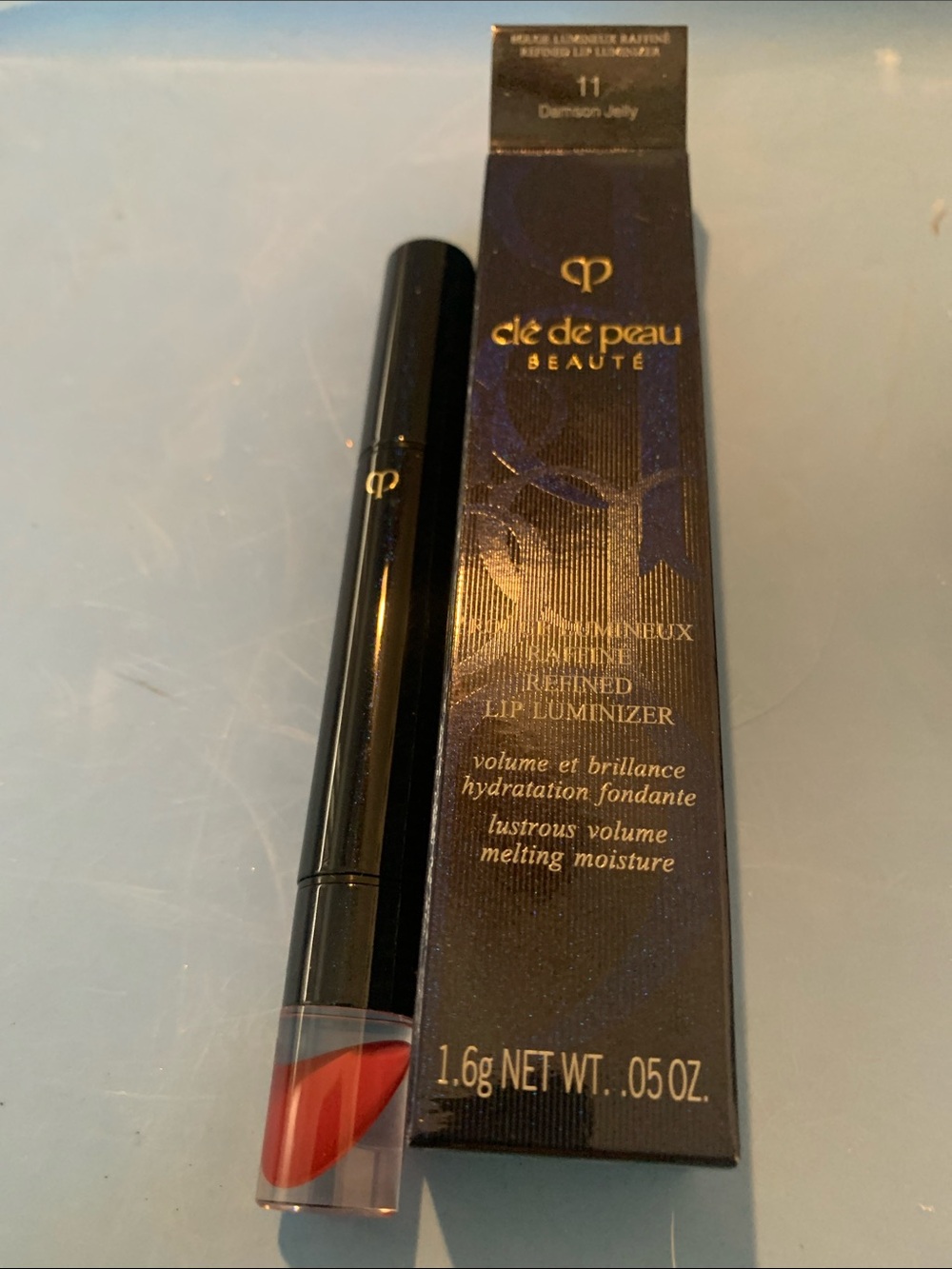 cle de peau Beauté Refined Lip Luminizer 11 Demimon Jelly - glossy red